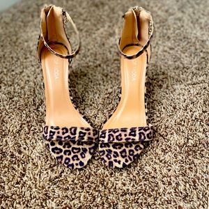 Leopard print open toe heel.
